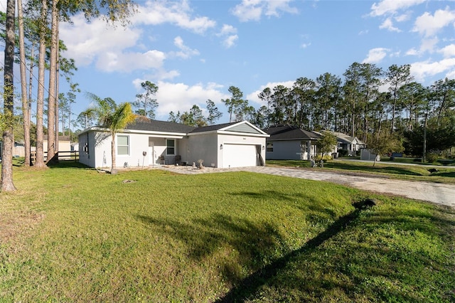 ranch-style home featuring a garage, driveway, a front lawn, and stucco siding