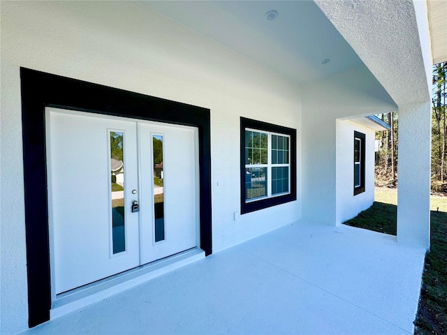 view of patio featuring french doors