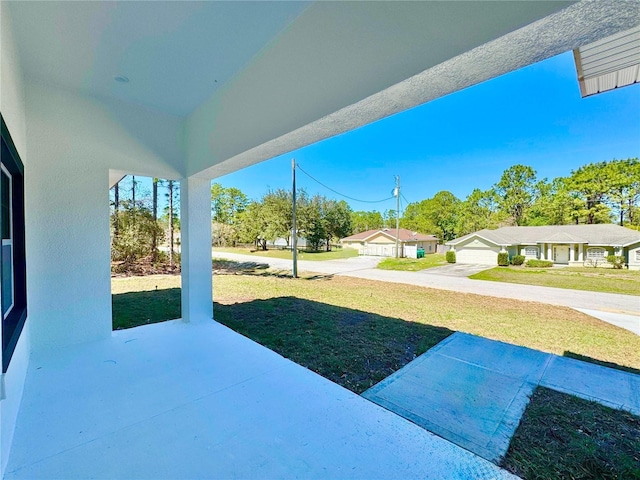 view of yard with a garage