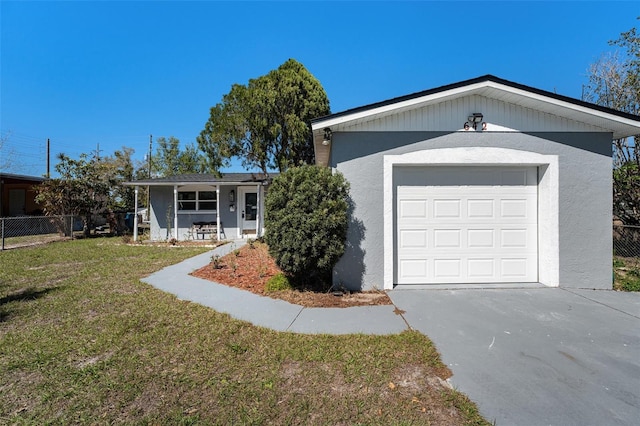 ranch-style house with a front yard, fence, a garage, and stucco siding