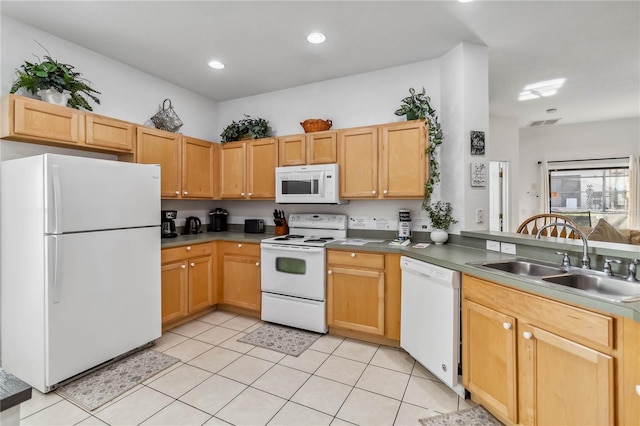 kitchen featuring white appliances, visible vents, light tile patterned flooring, recessed lighting, and a sink