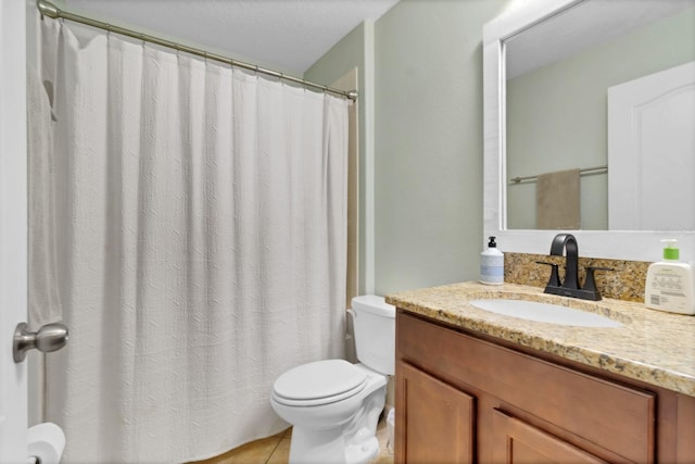 bathroom with toilet, tile patterned floors, a shower with shower curtain, and vanity