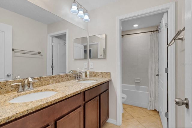 bathroom with double vanity, a sink, shower / bathtub combination with curtain, and tile patterned floors