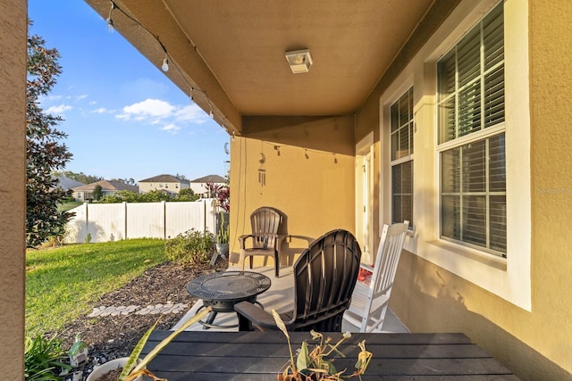 view of patio featuring fence