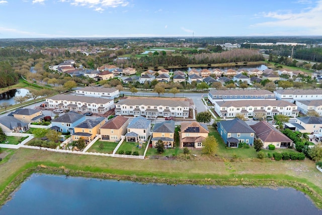 aerial view featuring a residential view and a water view