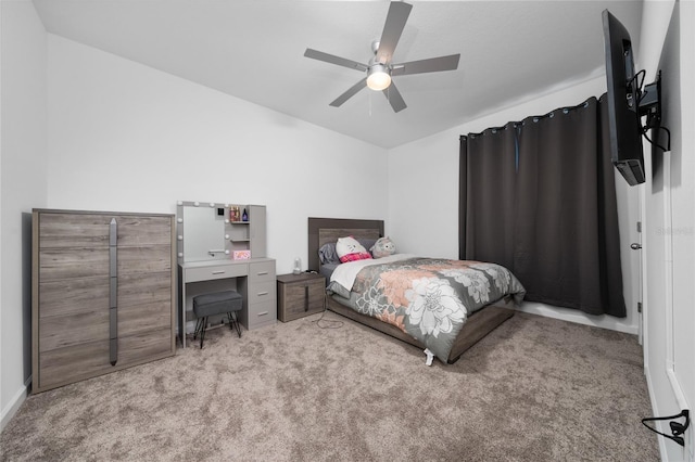 carpeted bedroom featuring a ceiling fan