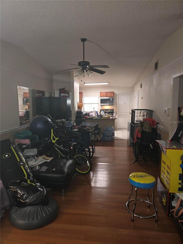 garage featuring visible vents and a ceiling fan