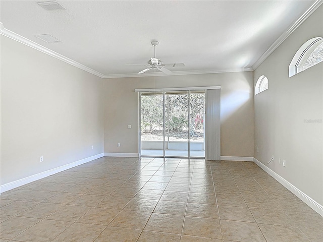 unfurnished room featuring ceiling fan, ornamental molding, light tile patterned flooring, and baseboards