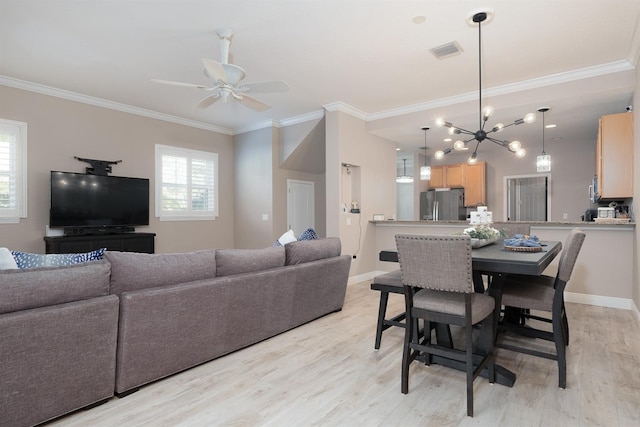 living area featuring baseboards, light wood-style flooring, visible vents, and crown molding