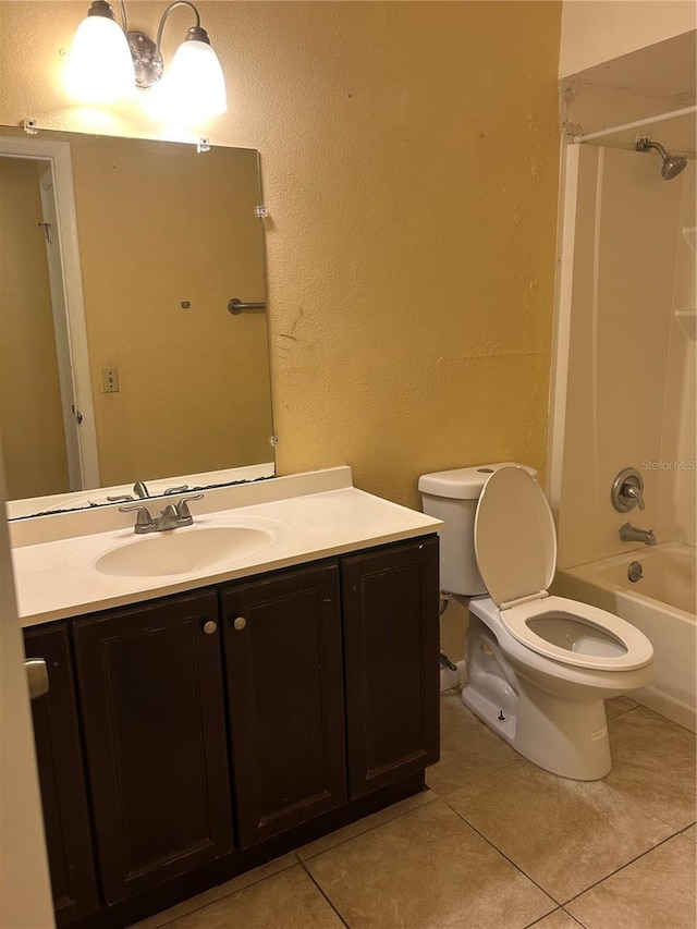 full bathroom with toilet, shower / bathtub combination, vanity, and tile patterned floors