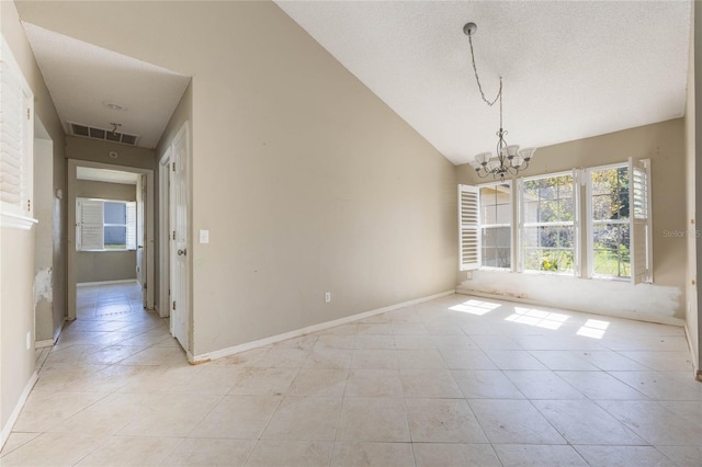 interior space with visible vents, high vaulted ceiling, a textured ceiling, an inviting chandelier, and baseboards