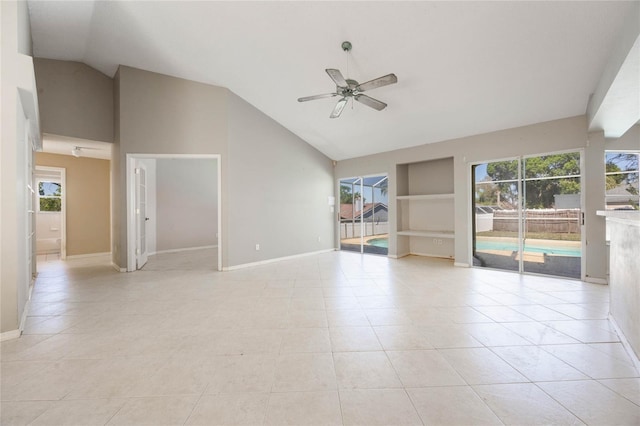 spare room featuring built in features, baseboards, light tile patterned floors, and ceiling fan