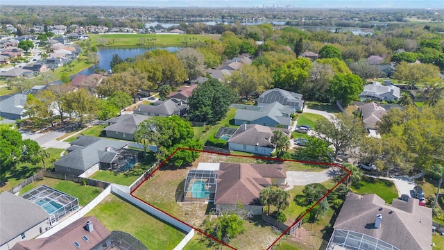 bird's eye view with a residential view and a water view