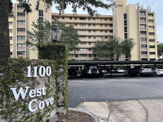 view of property with covered parking