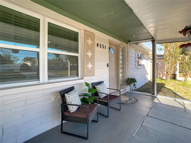 view of patio featuring covered porch