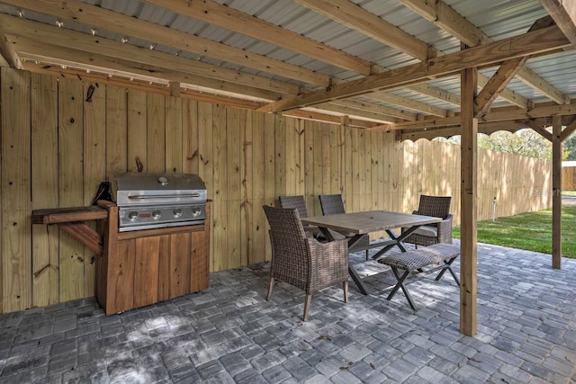 view of patio / terrace with grilling area and outdoor dining space