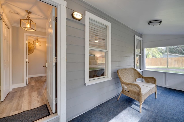 sunroom featuring visible vents