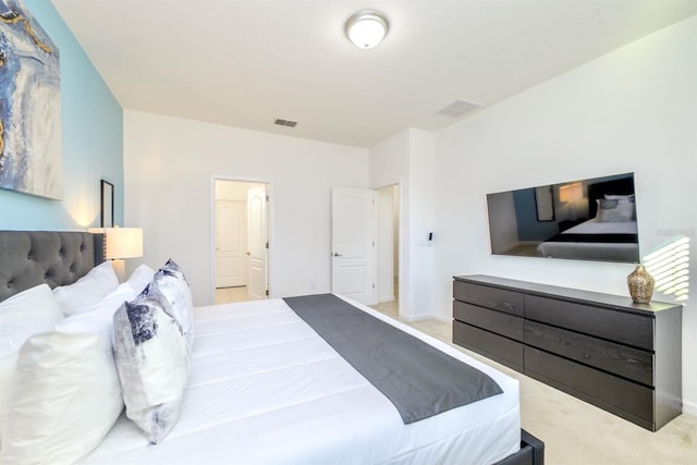 bedroom with baseboards, visible vents, and carpet flooring