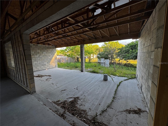 view of patio / terrace featuring fence