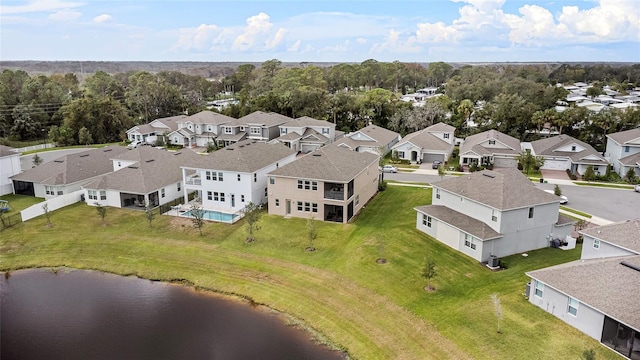 aerial view featuring a water view and a residential view