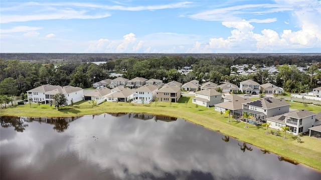 bird's eye view featuring a water view and a residential view