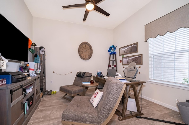 office with wood finish floors, ceiling fan, and baseboards