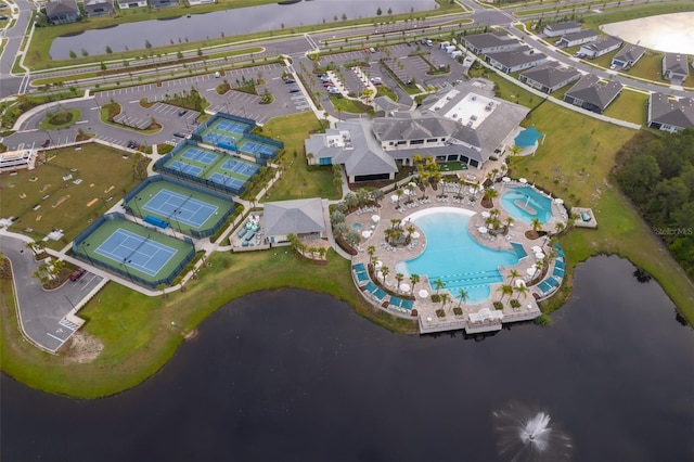 bird's eye view with a residential view and a water view