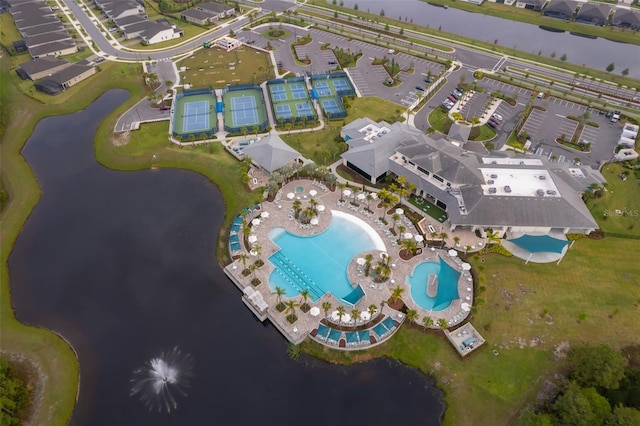 bird's eye view featuring a water view and a residential view