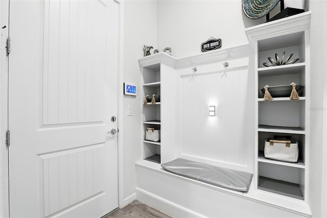 mudroom with wood finished floors