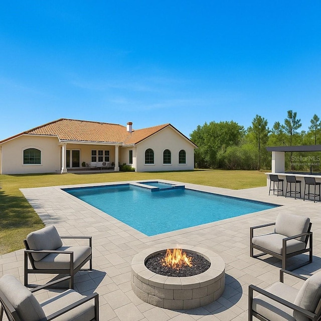 6005 Bancroft Blvd, Orlando, FL 32833 - view of pool featuring a fire pit, a patio area, a yard, and a pool with connected hot tub