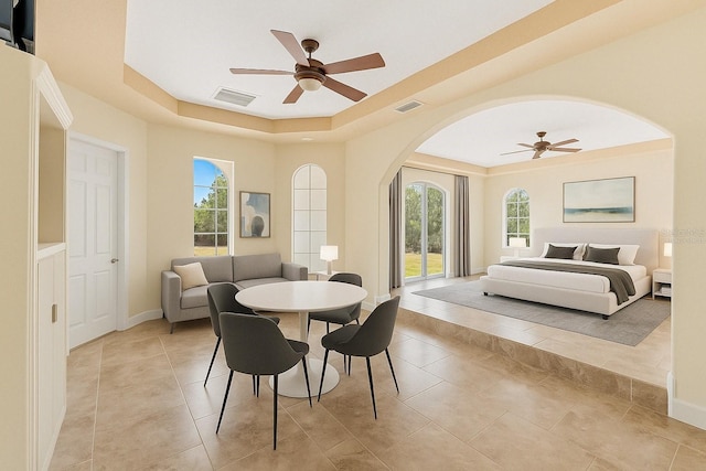 6005 Bancroft Blvd, Orlando, FL 32833 - dining room with a tray ceiling, a ceiling fan, and plenty of natural light