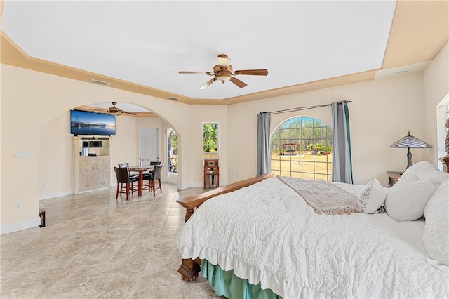 6005 Bancroft Blvd, Orlando, FL 32833 - bedroom featuring arched walkways and ceiling fan