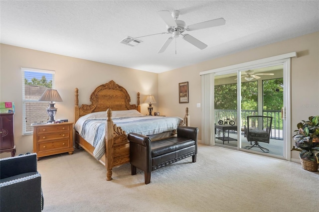 bedroom with visible vents, multiple windows, light colored carpet, and access to outside