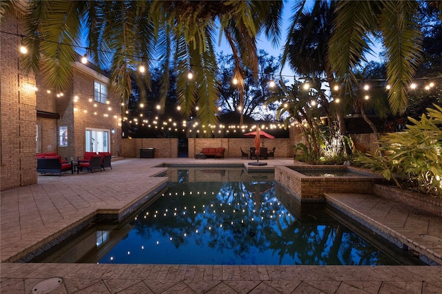 view of pool with a patio area and a fenced in pool