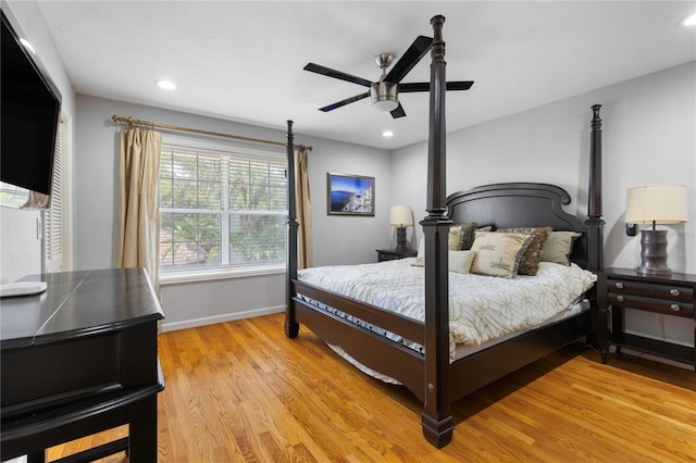 bedroom with light wood-style flooring, recessed lighting, baseboards, and ceiling fan