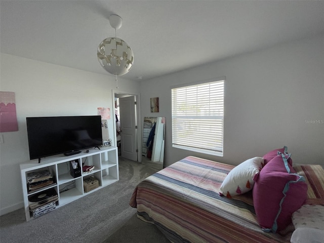 bedroom featuring carpet