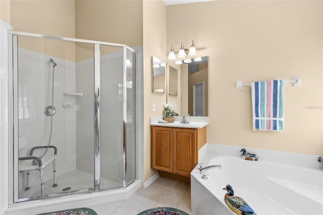 full bathroom featuring a garden tub, a stall shower, tile patterned flooring, and vanity