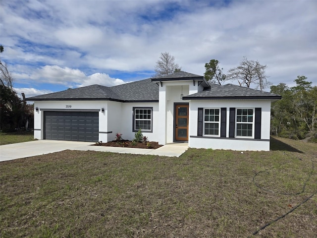 view of front facade with a shingled roof, concrete driveway, an attached garage, a front yard, and stucco siding