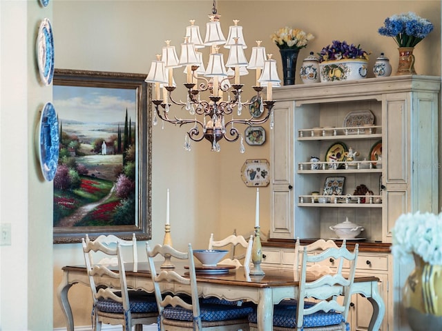 dining room featuring a notable chandelier