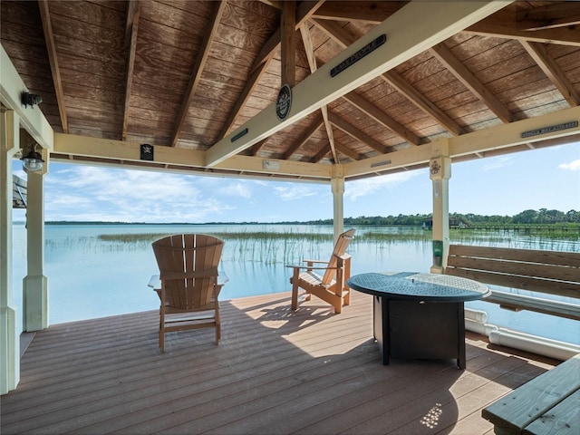 dock area with a water view