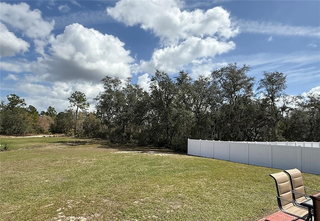 view of yard with fence