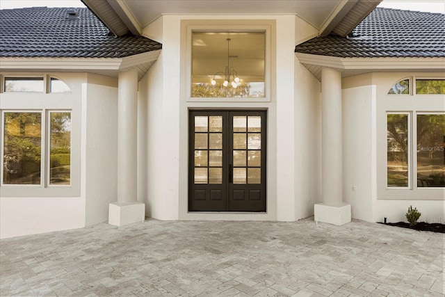 view of exterior entry with french doors