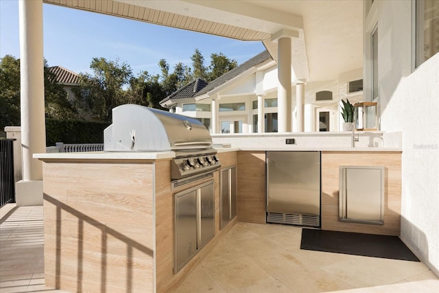 view of patio / terrace featuring a grill and area for grilling