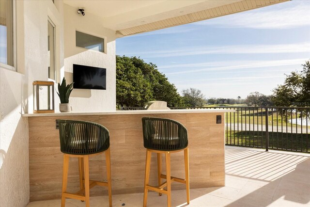 exterior space featuring outdoor dry bar