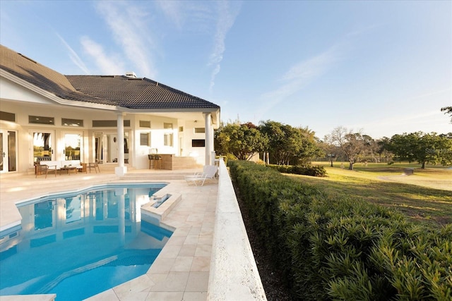 pool featuring a patio area