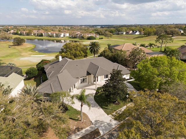 aerial view with view of golf course and a water view