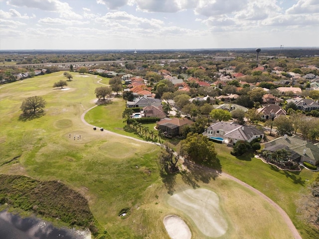 aerial view featuring view of golf course and a residential view