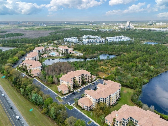 bird's eye view with a water view