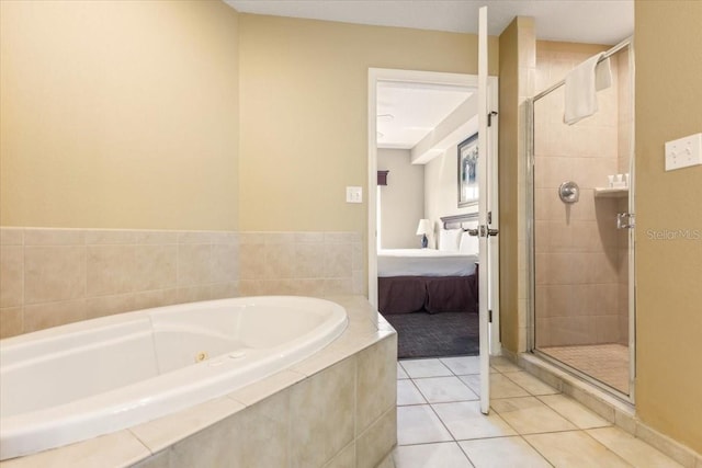 full bathroom featuring a stall shower, tile patterned flooring, connected bathroom, and a bath