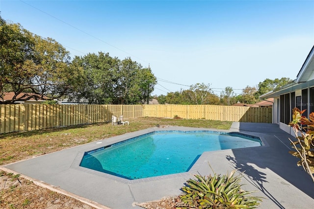 view of swimming pool featuring a patio, a fenced backyard, and a fenced in pool